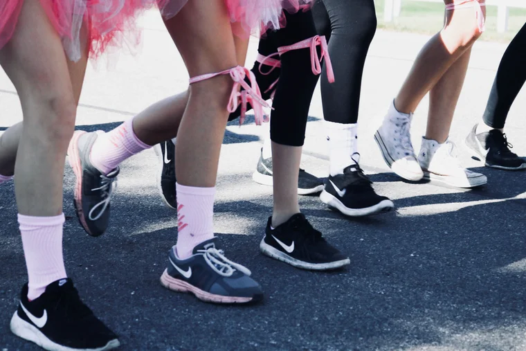 An image of individuals participating in a charitable 5k