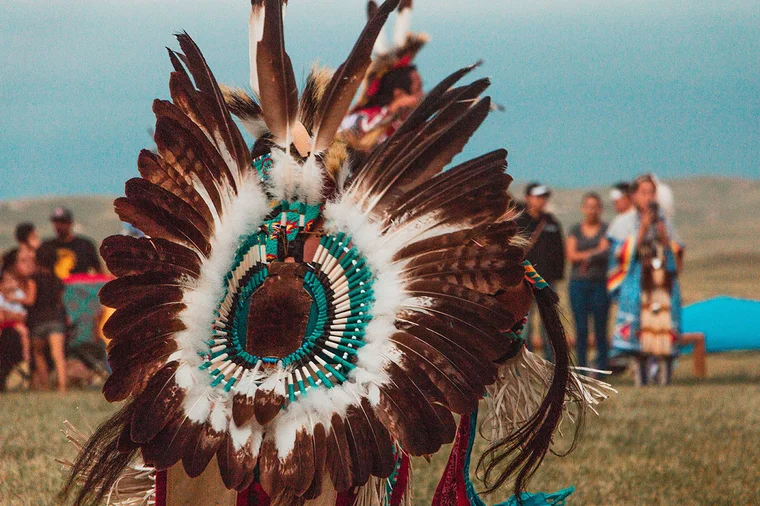 An image of an indigenous person in traditional dress