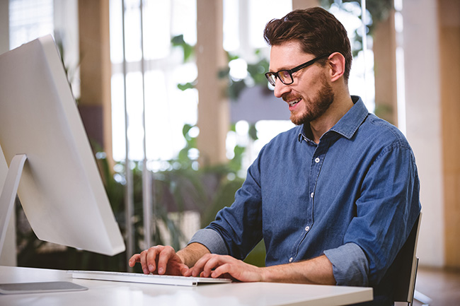 A nonprofit employee updating their metrics on the charity navigator portal